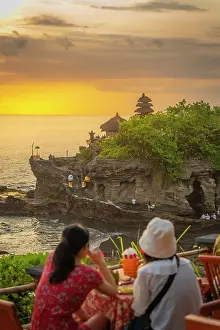 Bali Prints: Tourists at Tanah Lot, traditional Balinese temple at sunset