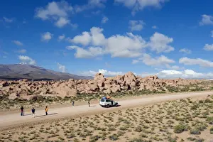 Altiplano Prints: Tourists visiting rock formations in the altiplano desert, Bolivia, South America