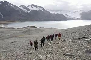 Images Dated 27th February 2009: Tourists walk from Fortuna Bay, South Georgia, South Atlantic