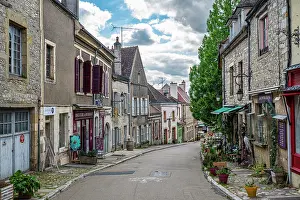 Streets Prints: Tourists walk along the narrow streets of Vezelay exploring local shops