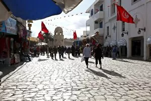 Images Dated 26th October 2010: Tourists walking to the Medina, Place des Martyrs, Sousse, Tunisia, North Africa, Africa