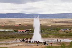 Iceland Gallery: Tourists watching Strokkur Geyser erupting, Geysir, Iceland, Polar Regions
