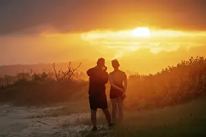 Silhouettes Prints: Tourists watching sunset, Isla Isabela, Galapagos Islands, Ecuador