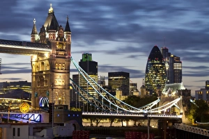 Tower Bridge and the City of London at night, London, England, United Kingdom, Europe