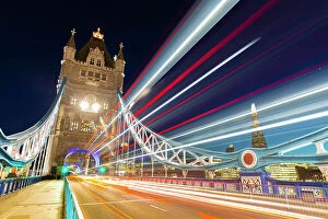 Tower Bridge Collection: Tower Bridge and light traffic trails, The Shard in the background, London, England