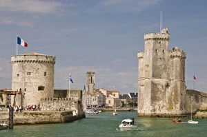 The towers of La Chaine and St. Nicholas at the entrance to the ancient port of La Rochelle