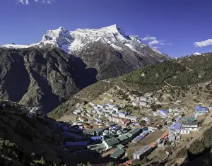 Snowcapped Prints: The town of Namche Bazaar with the Kongde Ri (Kwangde Ri) mountain range in the background
