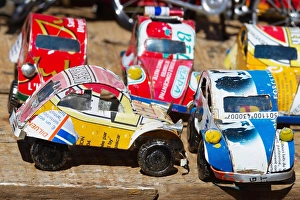 Images Dated 4th December 2007: Toy cars made with metal food box and sold on the National 7 road, Madagascar, Africa