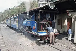 Locomotive Prints: Toy train from Darjeeling to plains refuelling at Goom station