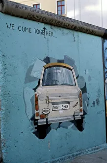 Images Dated 30th July 2008: A Trabant car painted on a section of the Berlin Wall