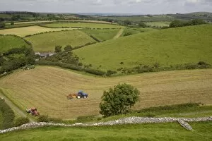 Images Dated 16th August 2010: Tractors harvesting in field by Carreg Cennon, Brecon Beacons National Park