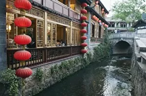 Images Dated 24th April 2008: Traditional architecture of riverside restaurant in Lijiang Old Town, Lijiang