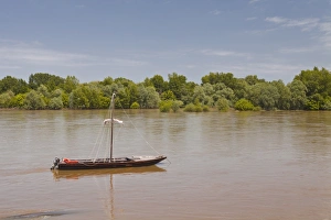 Chaumont Sur Loire Prints: Traditional boat on the River Loire at Chaumont-sur-Loire