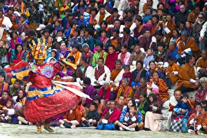 Bhutan Prints: Traditional dancer at the Paro festival, Paro, Bhutan, Asia