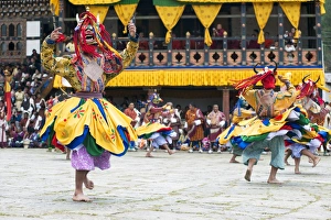 Bhutan Prints: Traditional dancers at the Paro festival, Paro, Bhutan, Asia