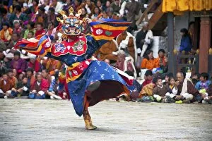 Traditional dancers at the Paro festival, Paro, Bhutan, Asia