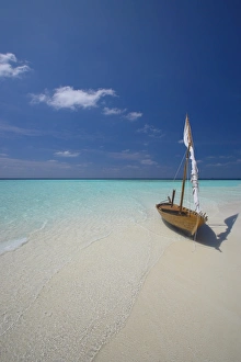 Dhoni Prints: Traditional dhoni on the beach, Maldives, Indian Ocean, Asia