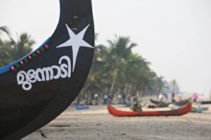 Stereotypically Indian Prints: Traditional fishing boats at Marari Beach, Kerala, India, Asia
