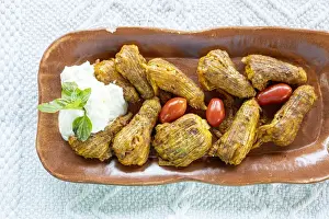 Vegetable Prints: Traditional fried stuffed zucchini flowers with Tzatziki sauce
