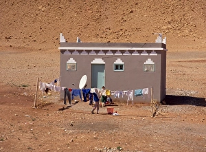 Washing Line Prints: Traditional house with satellite dish outside