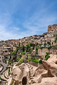 Cappadocia Prints: Traditional houses rise on the hillside in Uchisar
