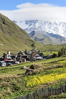Traditional medieval Svanetian tower houses, Ushguli village, Shkhara Moutains behind