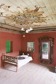 Restored Prints: Traditional mud floor contrasting with the magnificently