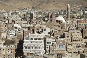 Traditional ornamented brick architecture on tall houses, Old City, within Sana a