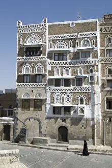 Traditional ornamented brick architecture on tall houses, Old City, Sana a