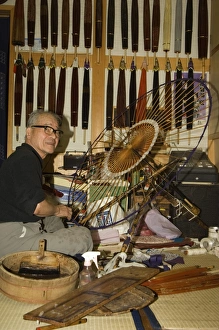 Senior Man Prints: Traditional parasol and umbrella makers shop