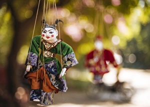 Mandalay Prints: Traditional puppets hanging from tree, Bagan (Pagan), Mandalay Region, Myanmar (Burma)