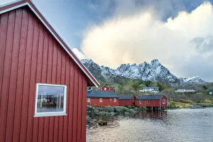 Nordland Gallery: Traditional red wooden houses of fishermen at sunset, Ballstad, Vestvagoy, Nordland county