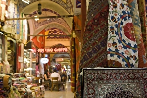 Trading Prints: Traditional rugs with cafe in the background, Grand Bazaar, Istanbul, Turkey, Europe