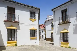 Ronda Prints: Traditional Spanish whitewashed houses near Plaza Duquesa de Parcent, Ronda, Andalusia