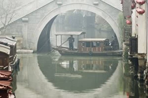 Images Dated 10th January 2008: Traditional stone arched bridge and river boat in Shantang water town, Suzhou