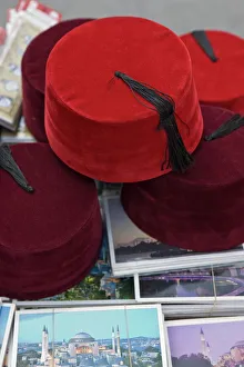 Images Dated 27th May 2008: Traditional Turkish fezes and postcards for sale, Istanbul, Turkey, Europe