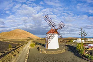 Traditional windmill and volcanic landscape, Tiagua, Lanzarote, Canary Islands, Spain