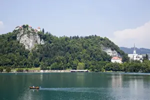 Rowing Boat Prints: Traditional wooden pletnja (rowing boat) to ferry tourists to St
