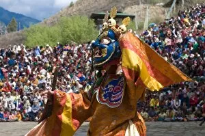 Images Dated 7th April 2009: Traditionally dressed dancer at the Paro Tsechu, a religious dance ceremony