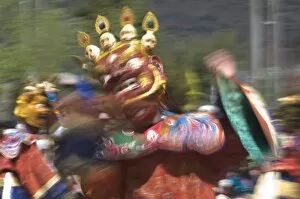 Images Dated 7th April 2009: Traditionally dressed dancer at the Paro Tsechu, a religious dance ceremony