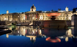 Art Gallery Collection: Trafalgar Square and National Gallery at dusk reflected in fountain, London, England