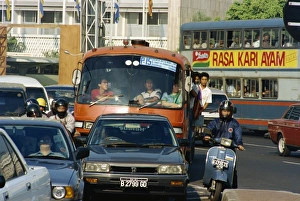 Approaching Prints: Traffic on a busy street in Jakarta