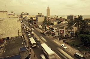 Sinelese Prints: Traffic in Colombo beneath monsoon skies