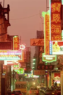 Macau Prints: Traffic and neon signs in the evening on Avenida Almeida Ribeiro in Macau, China, Asia