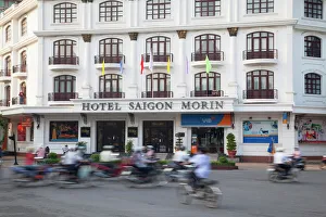 Hotels Prints: Traffic passing Hotel Saigon Morin