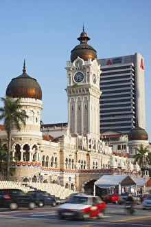 Traffic passing Sultan Abdul Samad Building, Merdeka Square, Kuala Lumpur Traffic passing Sultan Abdul Samad Building, Merdeka Square, Kuala Lumpur