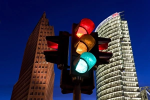 Images Dated 24th January 2000: Traffic signal and office buildings illuminated at