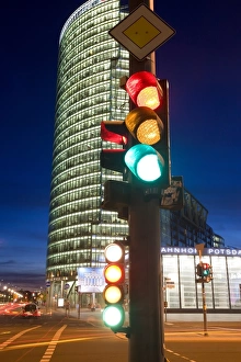 Images Dated 24th January 2000: Traffic signal and office buildings illuminated at