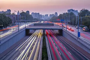 Freeways Prints: Traffic trail lights on major road near Beijing Zoo at dusk, Beijing, People s
