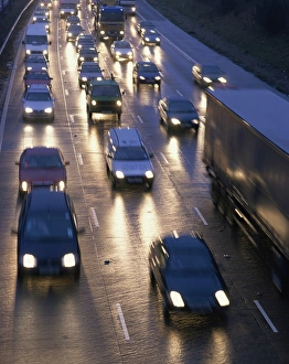 Motorways Prints: Traffic on wet motorway at dusk, United Kingdom, Europe